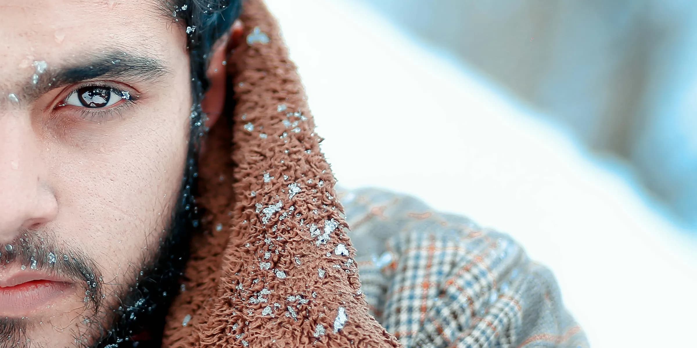 Close-up cinematic portrait with an intense gaze