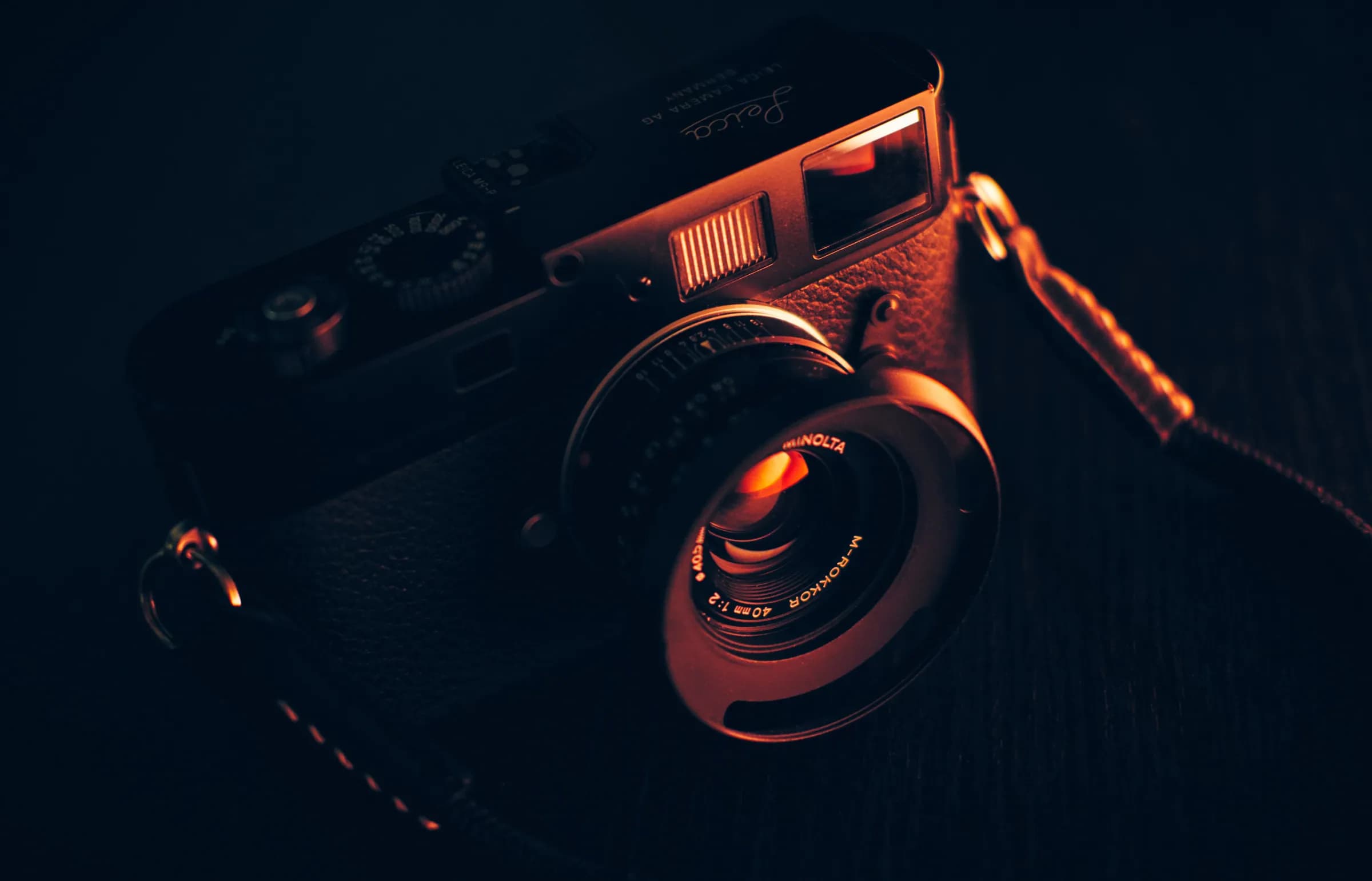 Vintage camera lit in warm red light