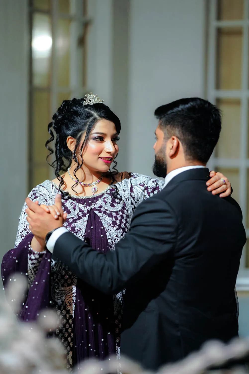 Couple dancing in an elegant hall